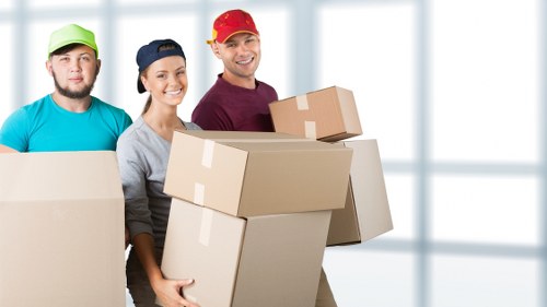 Furniture removals team handling a local move in Streatham