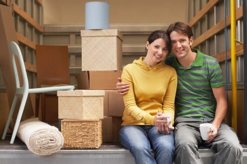 Mover assessing furniture volume for a quote